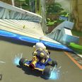 Video: Man plays Mario Kart while live band perform the soundtrack