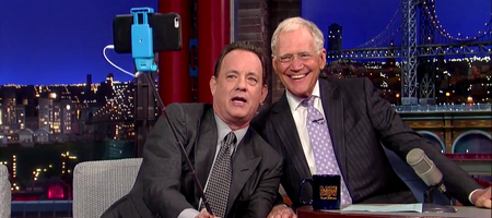 Tom Hanks introduces a bemused David Letterman to the selfie stick