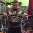 Russian monster bicep curls a terrifying 132kg bar for reps (Video)