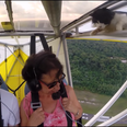 This cat hitched a ride on the wing of a small plane (video)