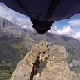 Italian daredevil flies through 2-metre mountain gap in wingsuit (Video)