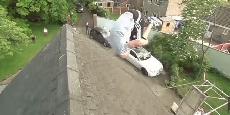 Crazy British stuntman front-flips over a house from a Russian swing