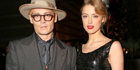 Johnny Depp’s wife Amber Heard charged with dog smuggling