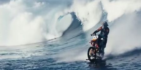 Stunt rider takes on wave on a dirt bike; awesomeness ensues