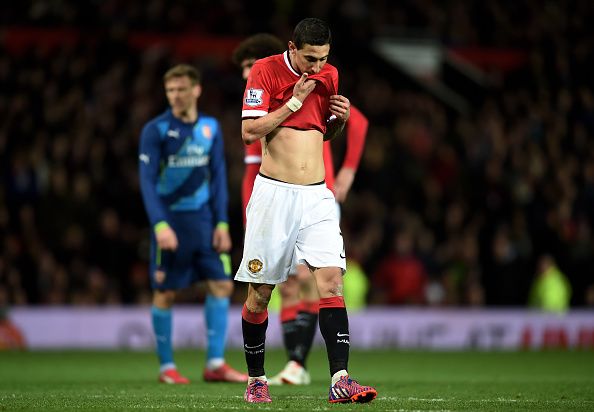 MANCHESTER, ENGLAND - MARCH 09:  A dejected Angel di Maria of Manchester United walks off the pitch after receiving the red card from referee Michael Oliver during the FA Cup Quarter Final match between Manchester United and Arsenal at Old Trafford on March 9, 2015 in Manchester, England.  (Photo by Michael Regan/Getty Images)