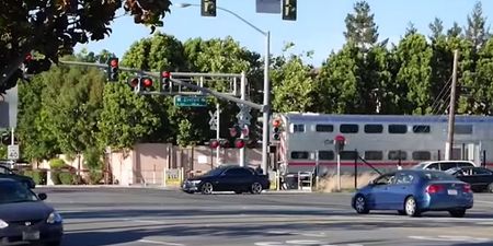 Watch a man pulled from his car seconds before a train hits…