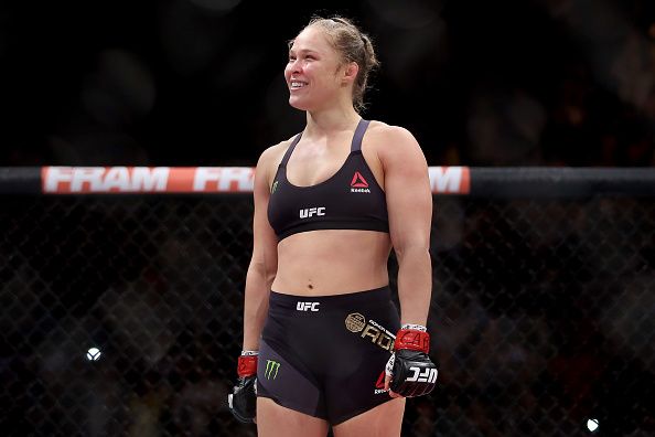 RIO DE JANEIRO, BRAZIL - AUGUST 01: Ronda Rousey of the United States defeats Bethe Correia of Brazil in their bantamweight title fight during the UFC 190 Rousey v Correia at HSBC Arena on August 1, 2015 in Rio de Janeiro, Brazil. (Photo by Matthew Stockman/Getty Images)