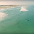 Drone captures surfers’ close encounter with shark