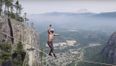 Unharnessed slacklining daredevil breaks record over 1000-ft canyon (video)