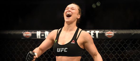 <> in their UFC women's bantamweight championship bout during the UFC 184 event at Staples Center on February 28, 2015 in Los Angeles, California.