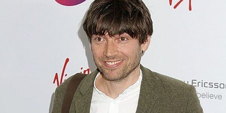 Blur’s Alex James proves all is forgiven by playing Oasis’ ‘Wonderwall’ (Video)