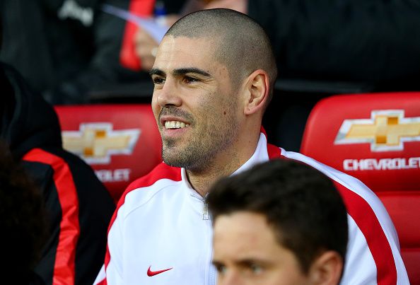 MANCHESTER, ENGLAND - JANUARY 11: Victor Valdes of Manchester United sits on the bench before the Barclays Premier League match between Manchester United and Southampton at Old Trafford on January 11, 2015 in Manchester, England. (Photo by Alex Livesey/Getty Images)