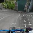 GoPro captures the moment a man mountain biked down a dam (Video)