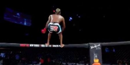 Fighter disastrously back-flips straight on to camerawoman (Video)