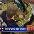 Watch this TV presenter drop his microphone into a tuba in the middle of a live broadcast