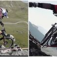 Mountain biker rides across a tightrope between two 300ft cliffs (Video)