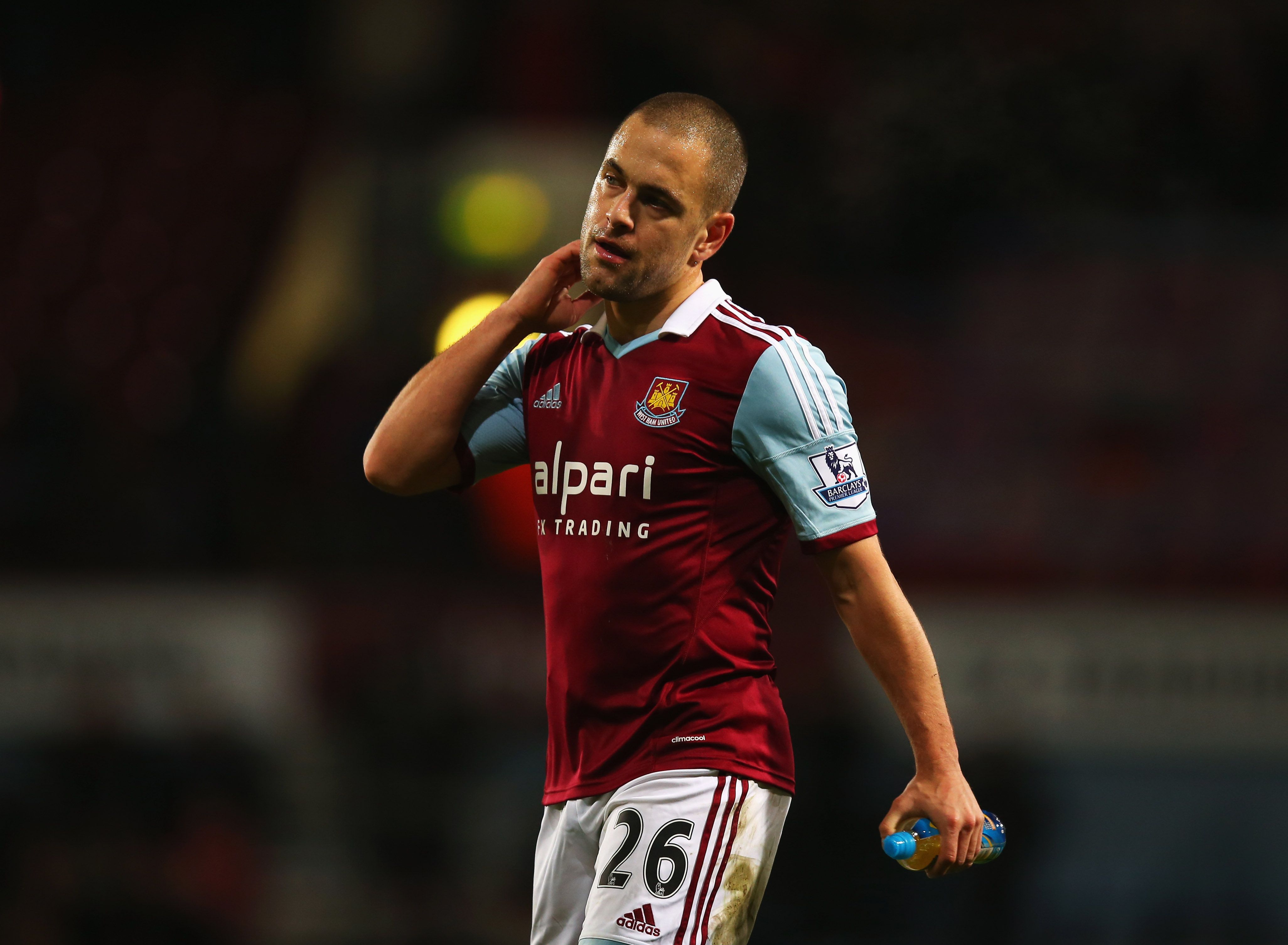 LONDON, ENGLAND - DECEMBER 26: Joe Cole of West Ham United looks dejected in defeat after the Barclays Premier League match between West Ham United and Arsenal at Boleyn Ground on December 26, 2013 in London, England. (Photo by Bryn Lennon/Getty Images)