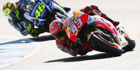 MotoGP legend Valentino Rossi kicks rival Marc Marquez off his bike at high speed (Video)