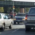 Idiot driver reverses Jeep down highway at dangerous speeds (Video)