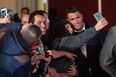 Cristiano Ronaldo shows ruthless efficiency when taking selfies with fans (Video)