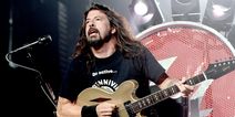 Dave Grohl turns up at homeless shelter with giant smoker and feeds 450 people