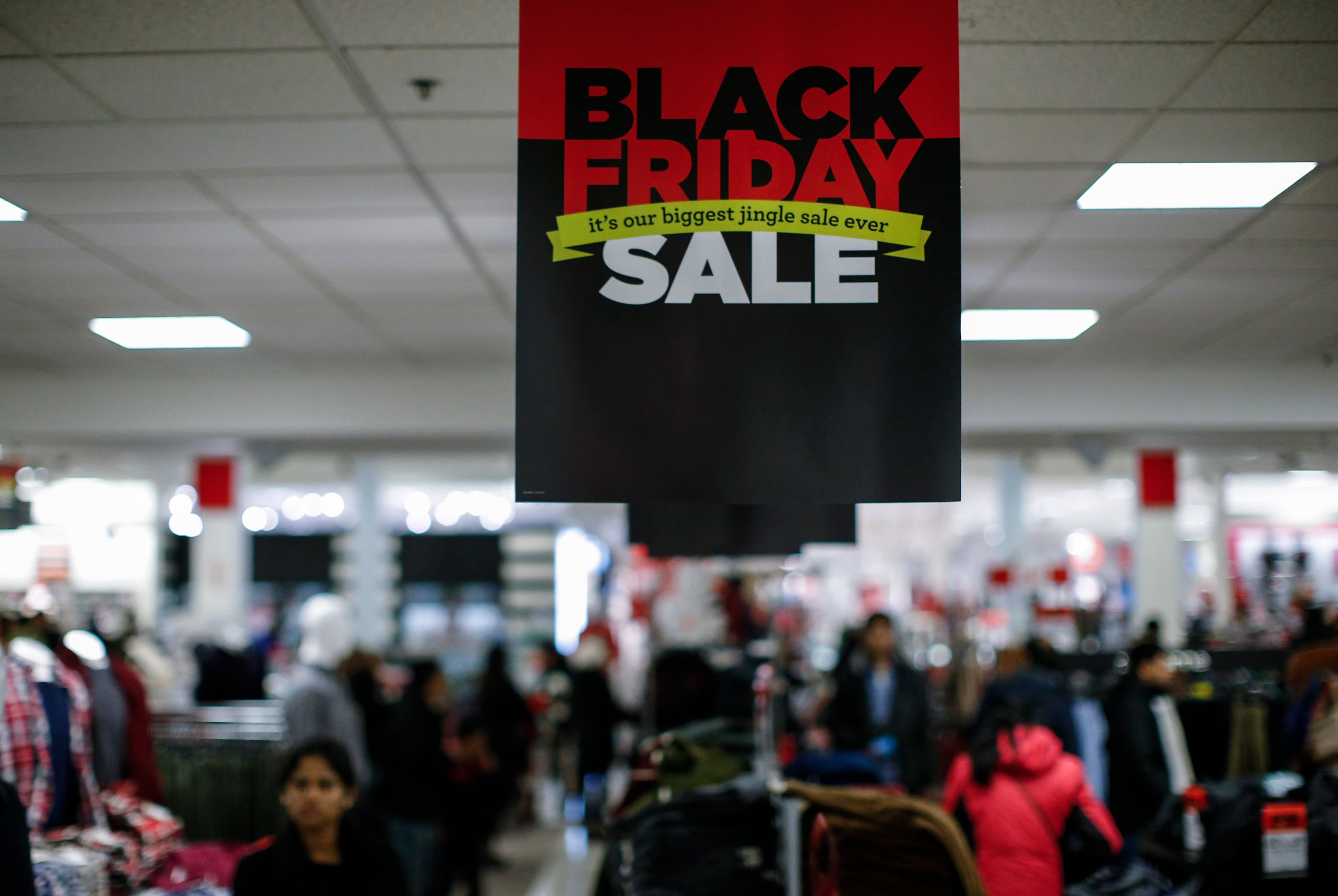 NEWPORT, NJ - NOVEMBER 27: People shop at the JCPenney store at the Newport Mall on November 27, 2014 in Jersey City, New Jersey. Black Friday sales, which now begin on the Thursday of Thanksgiving, continue to draw shoppers out for deals and sales. (Photo by Kena Betancur/Getty Images)