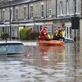 Flood victims slapped with parking tickets and battling bogus callers
