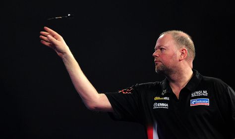LONDON, ENGLAND - JANUARY 01: Raymond van Barneveld of the Netherlands throws during his quarter final match against Michael Smith of England during Day Thirteen of the 2016 William Hill PDC World Darts Championships at Alexandra Palace on January 1, 2016 in London, England. (Photo by Dan Mullan/Getty Images)