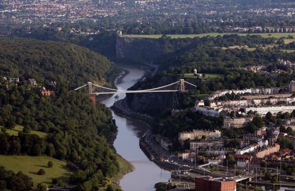 BRISTOL, UNITED KINGDOM - AUGUST 10: Traffic driving under Brunel's Clifton Suspension Bridge is seen from a hot air balloon during the early morning mass ascent at the Discovery Channel International Balloon Fiesta on August 10 2007 in Bristol, England. (Photo by Matt Cardy/Getty Images)