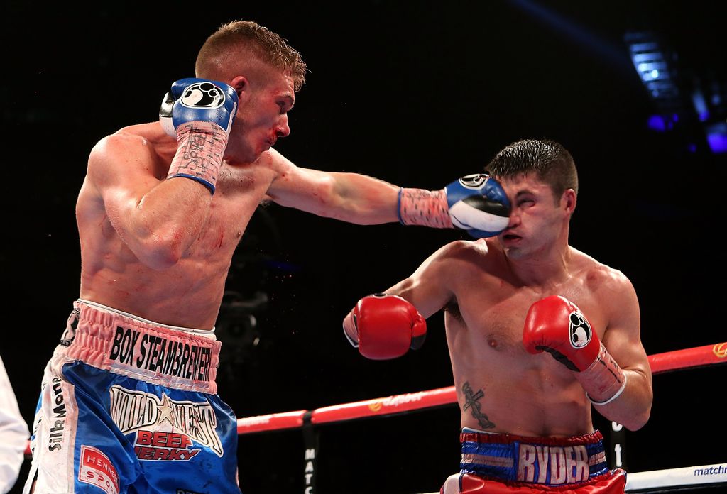 Nick Blackwell (L) lands a punch on John Ryder during their British Middleweight Championship fight (Ben Hoskins/Getty Images)