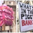 #ResignDavidCameron protesters are making a lot of pig jokes on their signs, of course