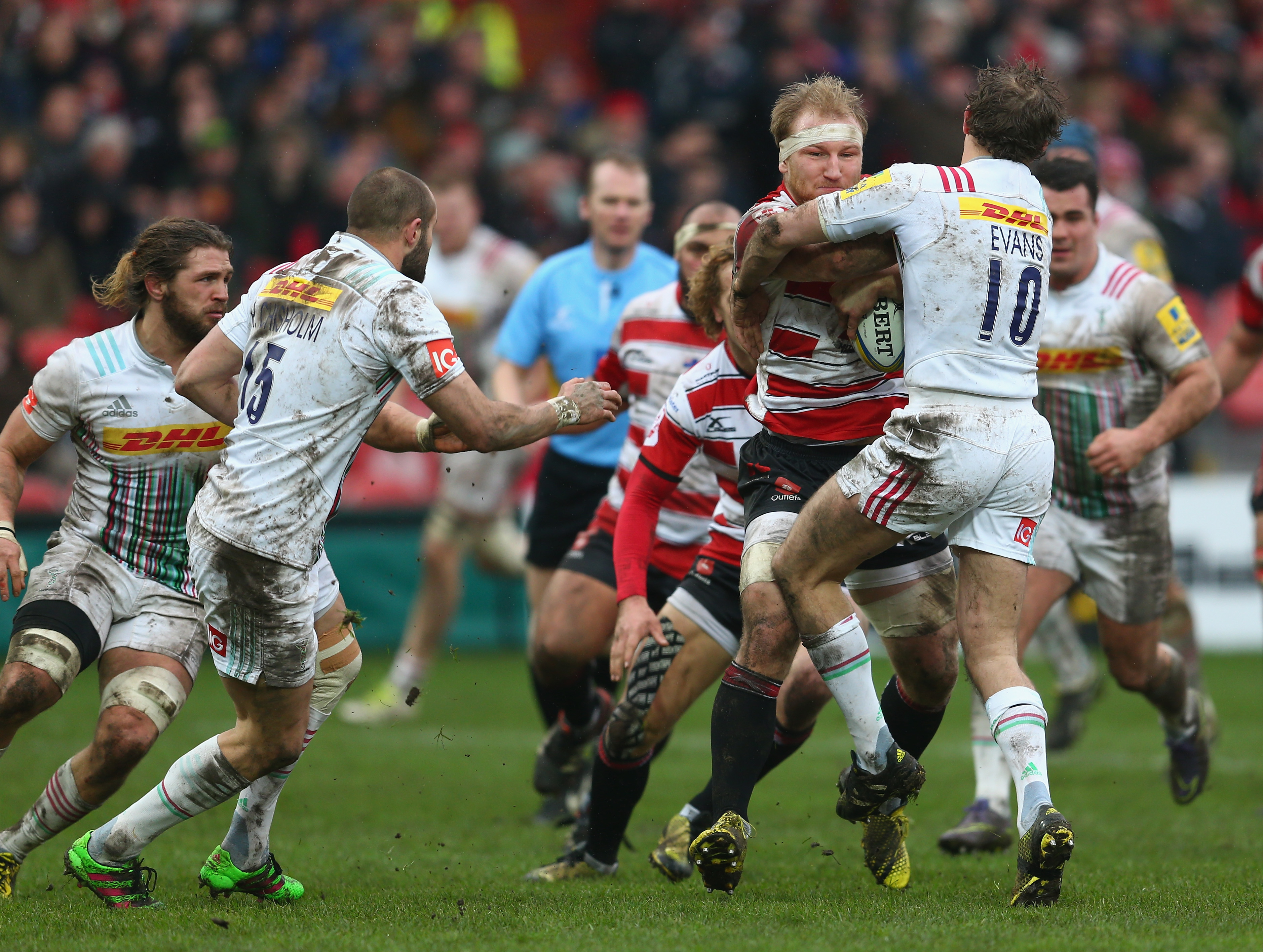 GLOUCESTER, ENGLAND - FEBRUARY 13: Matt Kvesic of Gloucester is stopped by Nick Evans of Quins during the Aviva Premiership match between Gloucester Rugby and Harlequins at Kingsholm Stadium on February 13, 2016 in Gloucester, England. (Photo by Christopher Lee/Getty Images)