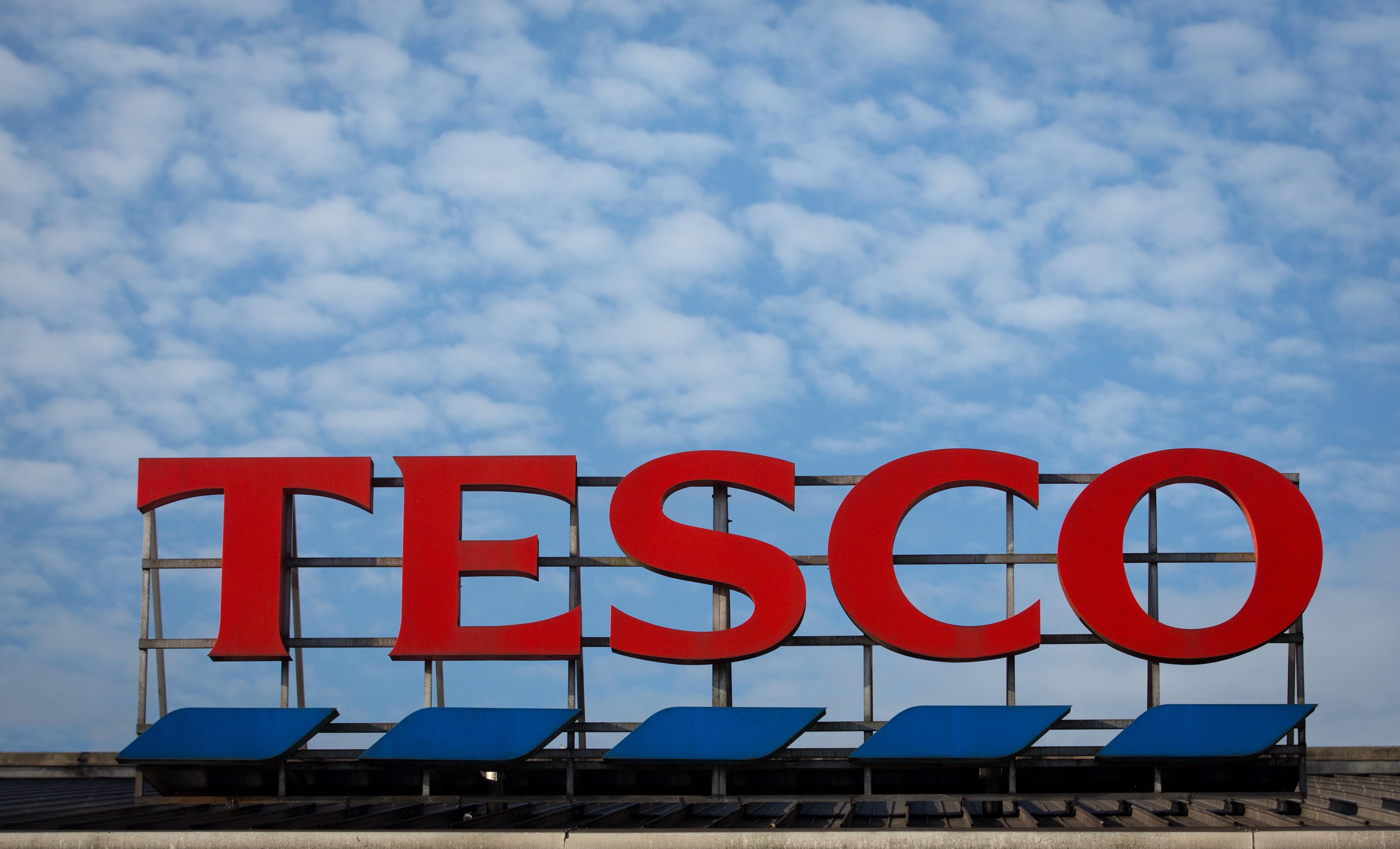 BRISTOL, ENGLAND - NOVEMBER 18: The Tesco sign is displayed outside a branch of the supermarket on November 18, 2015 in Bristol, England. As the crucial Christmas retail period approaches, all the major supermarkets are becoming increasingly competitive to retain and increase their share of the market. (Photo by Matt Cardy/Getty Images)