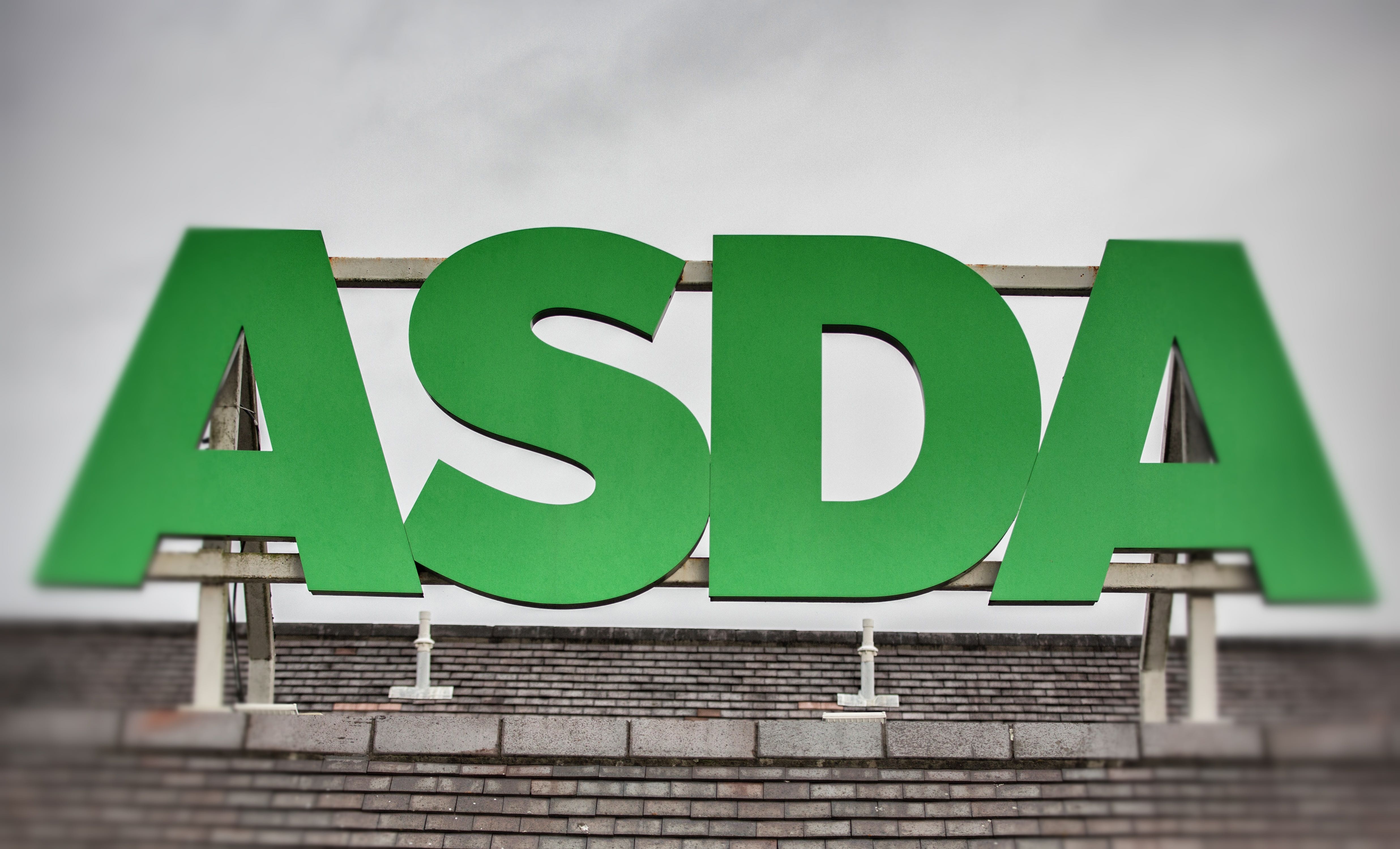 BRISTOL, ENGLAND - NOVEMBER 18: (EDITORS NOTE: This image was created using digital filters) The Asda sign is displayed outside a branch of the supermarket on November 18, 2015 in Bristol, England. As the crucial Christmas retail period approaches, all the major supermarkets are becoming increasingly competitive to retain and increase their share of the market. (Photo by Matt Cardy/Getty Images)