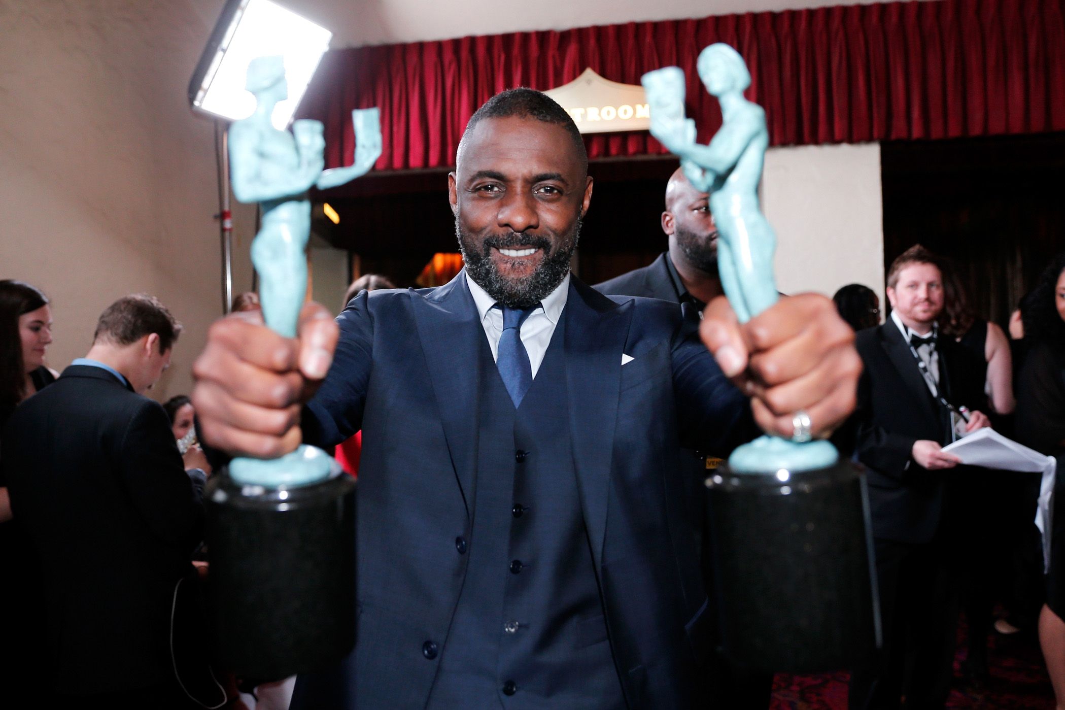 LOS ANGELES, CA - JANUARY 30:  Actor Idris Elba, winner of the awards for Outstanding Performance By a Male Actor in a Supporting Role for 'Beasts of No Nation' and Outstanding Performance By a Male Actor in a Television Movie or Miniseries for 'Luther', attends The 22nd Annual Screen Actors Guild Awards at The Shrine Auditorium on January 30, 2016 in Los Angeles, California. 25650_017  (Photo by Rich Polk/Getty Images for Turner)