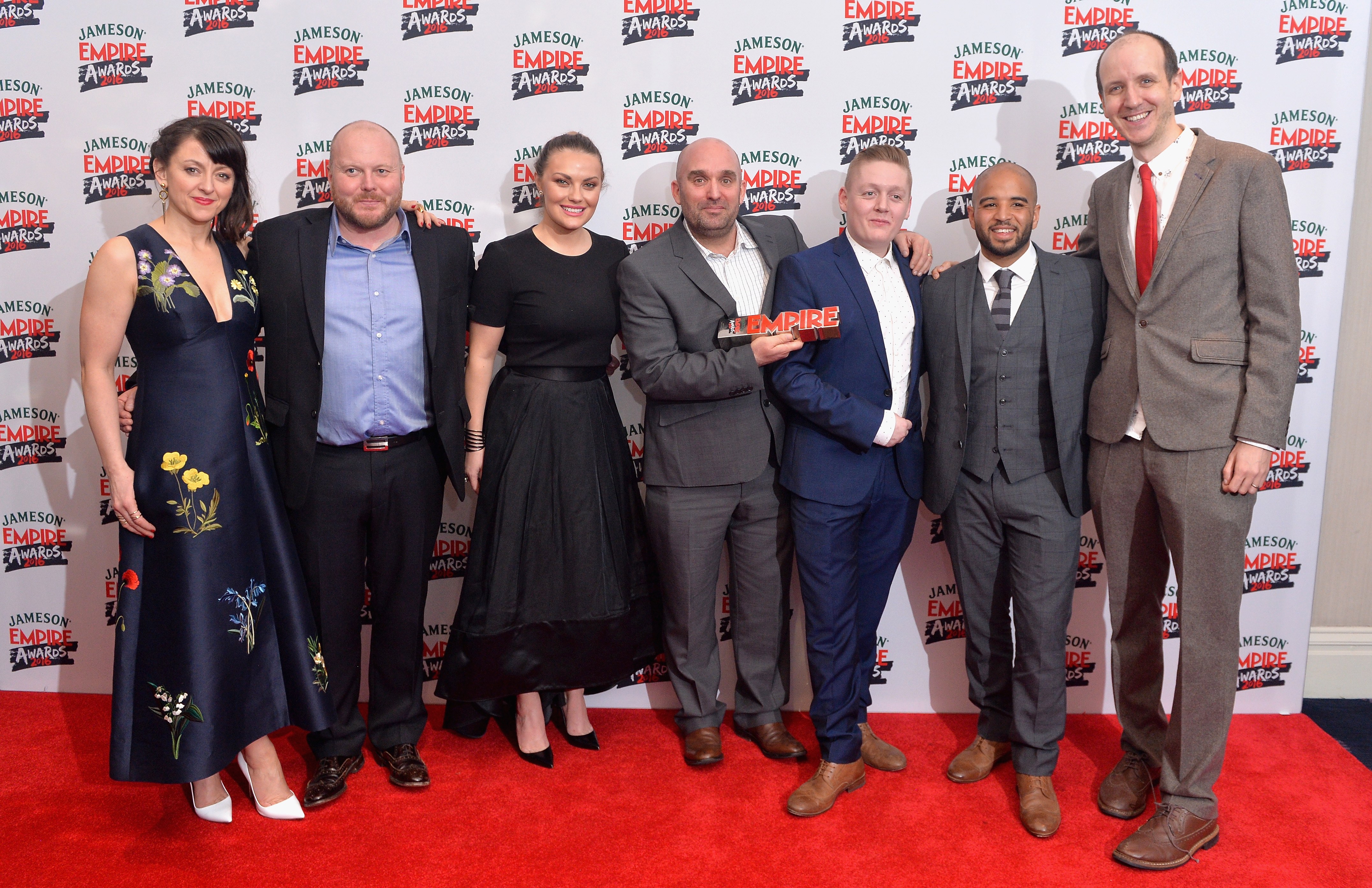 LONDON, ENGLAND - MARCH 20: Cast of This Is England '90; Jo Hartley, Mark Herbert, Chanel Cresswell, Shane Meadows, Thomas Turgoose, Andrew Shim and guest pose in the winners room at the Jameson Empire Awards 2016 at The Grosvenor House Hotel on March 20, 2016 in London, England. (Photo by Anthony Harvey/Getty Images)