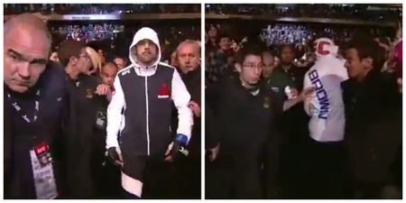 UFC fighter swings a punch at a fan who grabbed him during his UFC 198 walkout