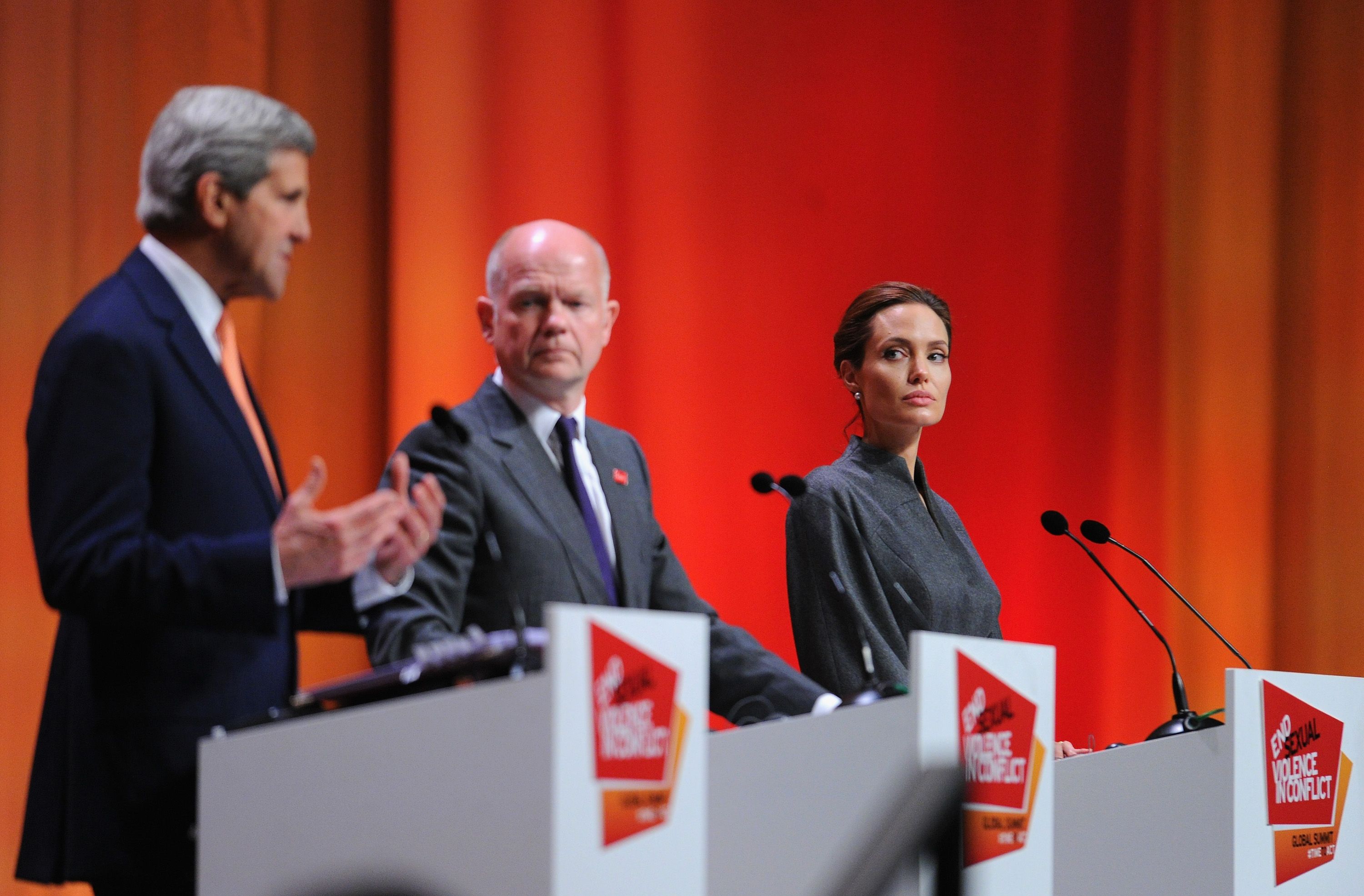 LONDON, ENGLAND - JUNE 13: United States Secretary of State John Kerry, British Foreign Secretary William Hague, UN Special Envoy and actress Angelina Jolie attend the Global Summit to End Sexual Violence in Conflict at ExCel on June 13, 2014 in London, England. The four-day conference on sexual violence in war is hosted by Foreign Secretary William Hague and UN Special Envoy and actress Angelina Jolie. (Photo by Eamonn M. McCormack/Getty Images)