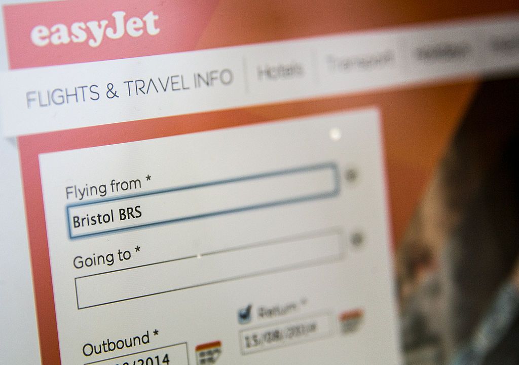 BRISTOL, UNITED KINGDOM - AUGUST 11: In this photo illustration a laptop displays the easyJet website on August 11, 2014 in Bristol, United Kingdom. This week marks the 20th anniversary of the first online sale. Since that sale - a copy of an album by the artist Sting - online retailing has grown to such an extent that it is now claimed that 95 percent of the UK population has shopped online and close to one in four deciding to shop online each week. (Photo Illustration by Matt Cardy/Getty Images)