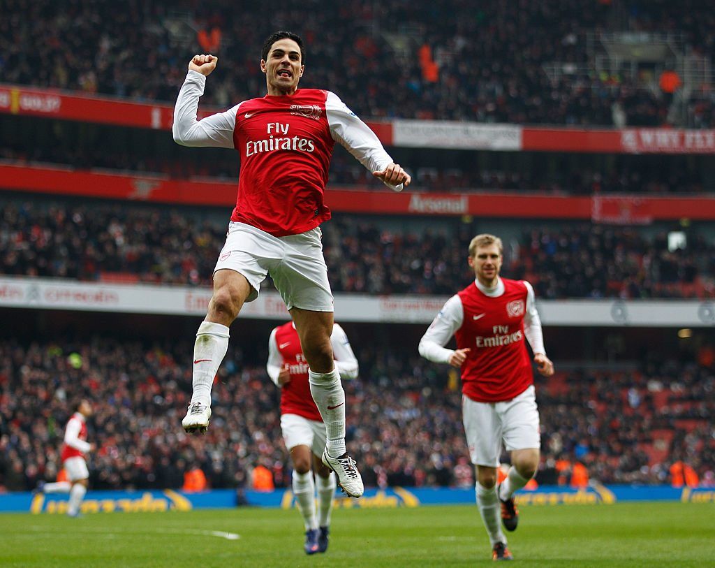 LONDON, ENGLAND - FEBRUARY 04: Mikel Arteta of Arsenal celebrates after scoring Arsenal's forth goal during the Barclays Premier League match between Arsenal and Blackburn Rovers at Emirates Stadium on February 4, 2012 in London, England. (Photo by Paul Gilham/Getty Images)