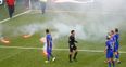 This might explain why Croatian supporters threw flares onto the pitch
