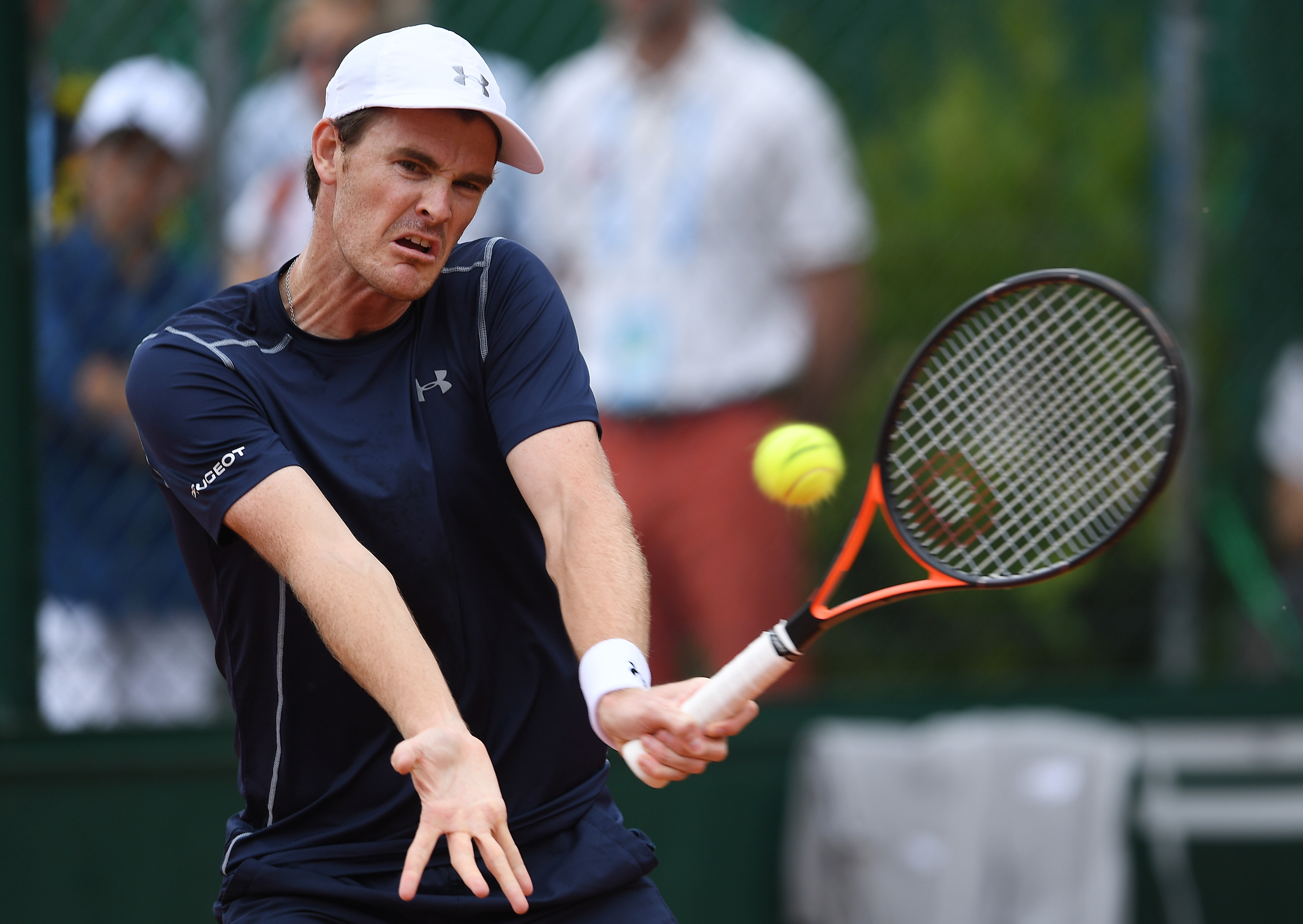 PARIS, FRANCE - MAY 28: Jamie Murray of Great Britain hits a forehand during the Men's Doubles second round match against David Guez of France and Vincent Millot of France on day seven of the 2016 French Open at Roland Garros on May 28, 2016 in Paris, France. (Photo by Dennis Grombkowski/Getty Images)