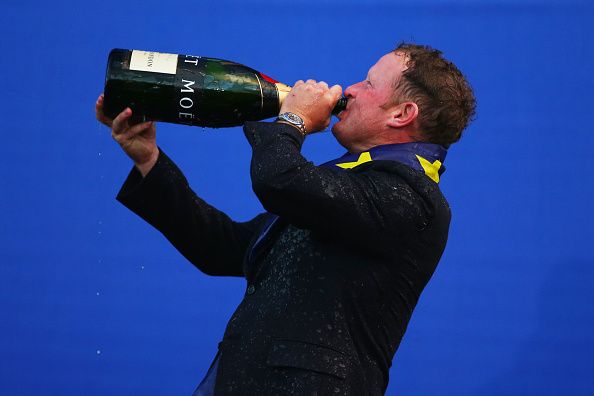 AUCHTERARDER, SCOTLAND - SEPTEMBER 28: Jamie Donaldson of Europe drinks champagne after Europe won the Ryder Cup after the Singles Matches of the 2014 Ryder Cup on the PGA Centenary course at the Gleneagles Hotel on September 28, 2014 in Auchterarder, Scotland. (Photo by Mike Ehrmann/Getty Images)