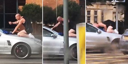 Astonishing footage of road rage driver punching and headbutting a moving vehicle