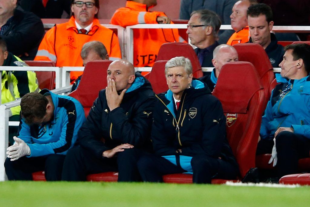 LONDON, ENGLAND - SEPTEMBER 29: Arsene Wenger, manager of Arsenal looks dejected with assistant Steve Bould during the UEFA Champions League Group F match between Arsenal FC and Olympiacos FC at the Emirates Stadium on September 29, 2015 in London, United Kingdom. (Photo by Shaun Botterill/Getty Images)