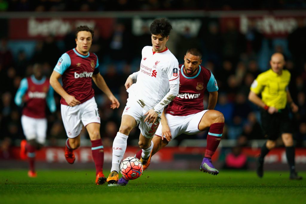 LONDON, ENGLAND - FEBRUARY 09: Joao Carlos Teixeira of Liverpool evades Mark Noble (L) and Winston Reid of West Ham United during the Emirates FA Cup Fourth Round Replay match between West Ham United and Liverpool at Boleyn Ground on February 9, 2016 in London, England. (Photo by Clive Rose/Getty Images)