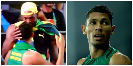 Usain Bolt took time out from his victory interview to congratulate Wayde van Niekerk