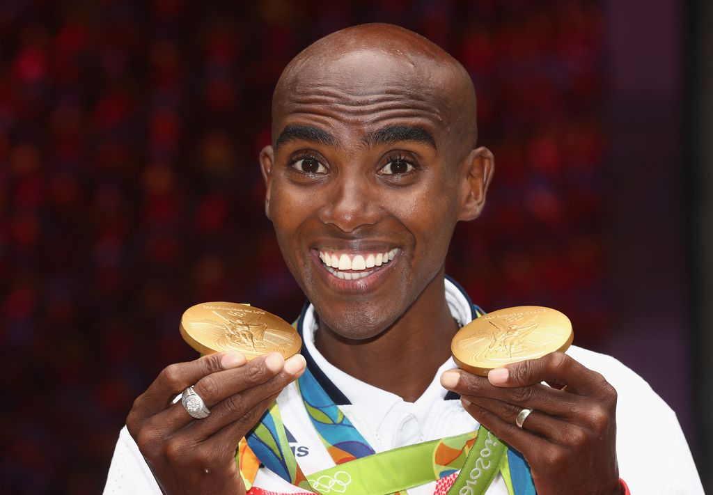 RIO DE JANEIRO, BRAZIL - AUGUST 21: Mo Farah of Great Britain, the double Gold Medal poses at British House on August 21, 2016 in Rio de Janeiro, Brazil. (Photo by David Rogers/Getty Images)