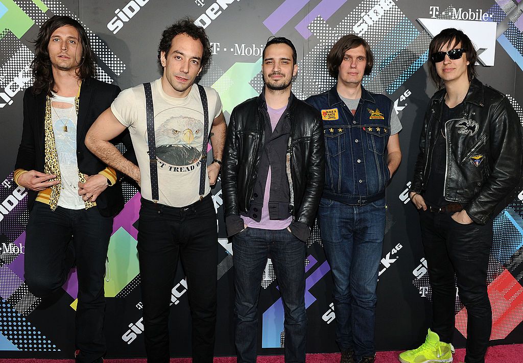 BEVERLY HILLS, CA - APRIL 20: Musicians Nick Valensi, Albert Hammond Jr., Fabrizio Moretti, Nikolai Fraiture and Julian Casablancas of The Strokes arrive at the launch party for the new T-Mobile Sidekick 4G at a Private Lot on April 20, 2011 in Beverly Hills, California. (Photo by Michael Buckner/Getty Images for T-Mobile)
