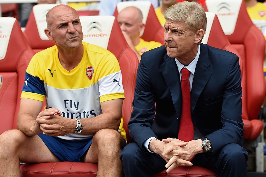 LONDON, ENGLAND - AUGUST 02: Arsenal assistant manager Steve Bould and manager Arsene Wenger look on during the Emirates Cup match between Arsenal and Benfica at the Emirates Stadium on August 2, 2014 in London, England. (Photo by Michael Regan/Getty Images)